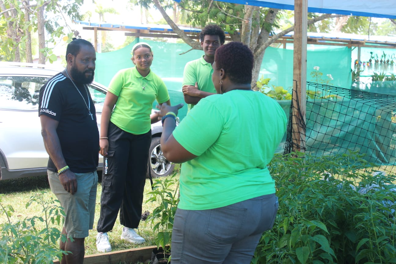 SIAH staff welcoming visitors at the 50th Independence Jubilee Expo
