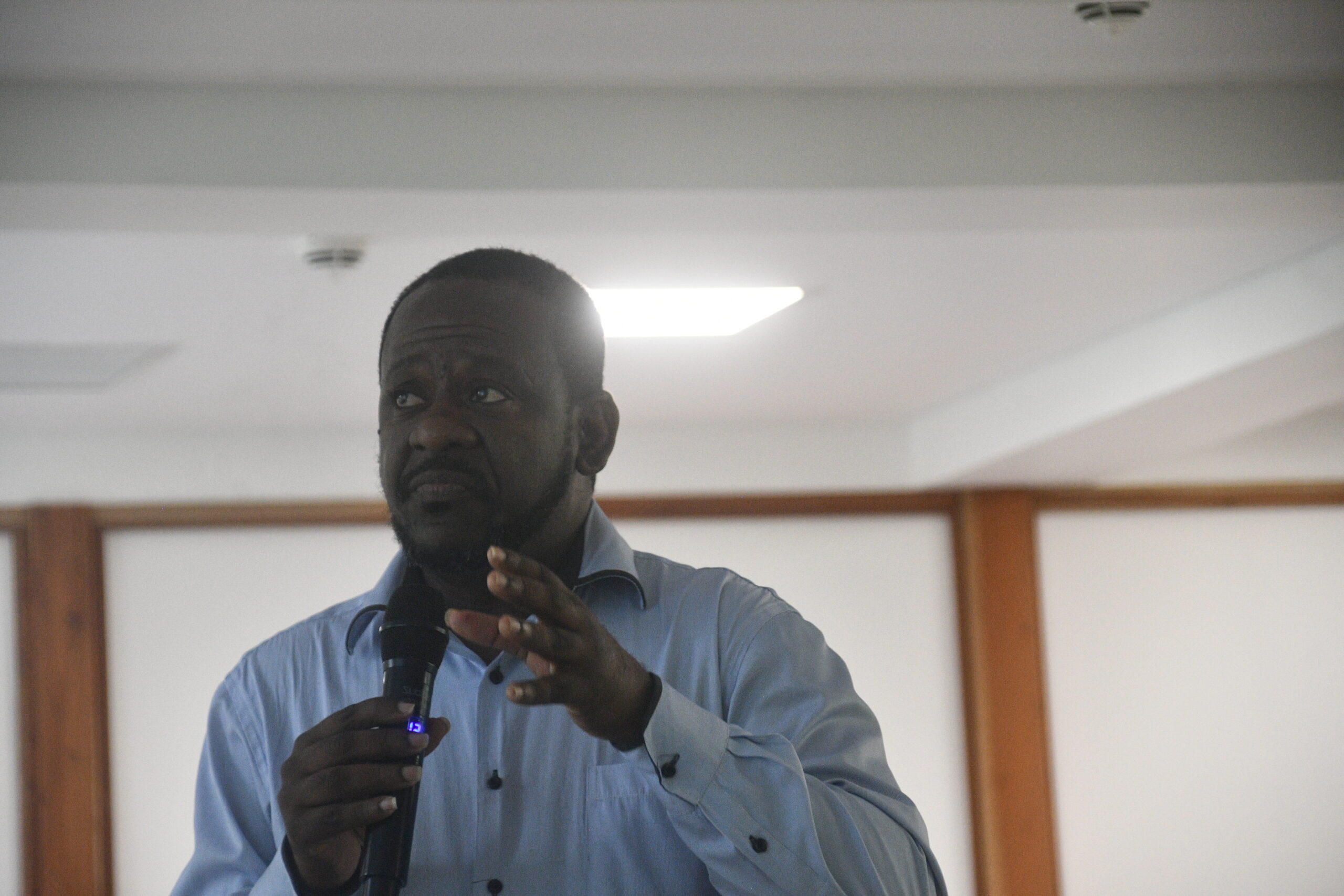 A speaker addressing participants during the SIAH Info Day